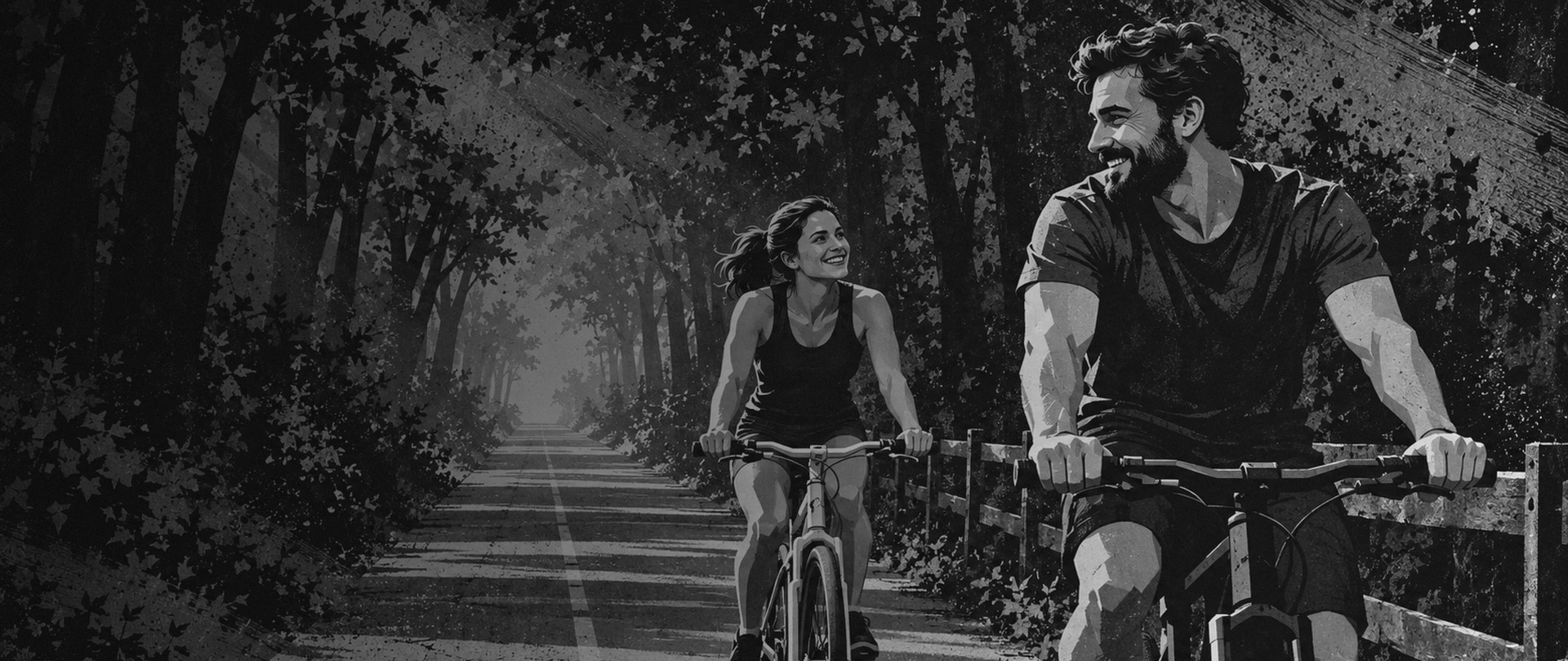 Two cyclists riding together on a tree-covered rail-trail in Carmel, Indiana, sunlight falling across the path